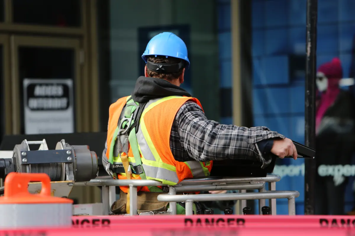 Technician working on site from an elevated work platform
